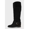 Suede boots with gold buckles