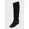 Suede boots with gold buckles