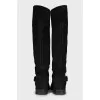Suede boots with gold buckles