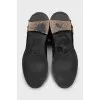 Suede boots with gold buckles