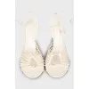 White leather lace-up sandals