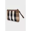 Clutch with branded print and tag