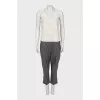 Jumpsuit with grey trousers and openwork top
