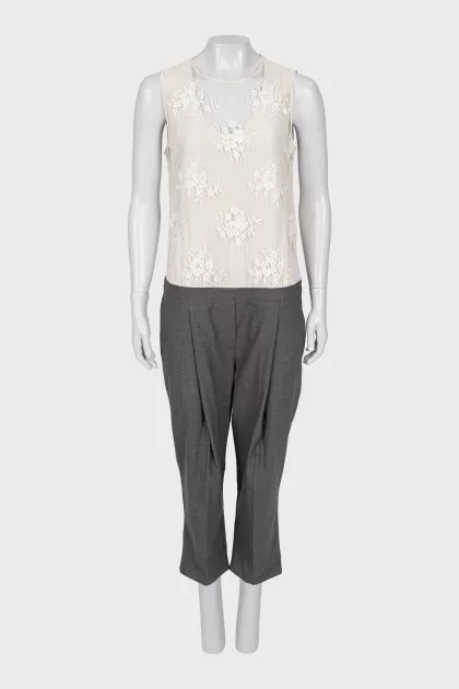 Jumpsuit with grey trousers and openwork top