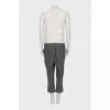 Jumpsuit with grey trousers and openwork top
