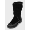 Insulated boots made of leather and suede
