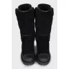 Insulated boots made of leather and suede