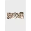 Brooch decorated with beads and crystals