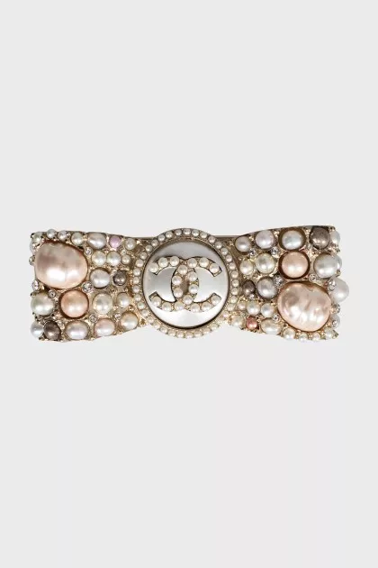Brooch decorated with beads and crystals