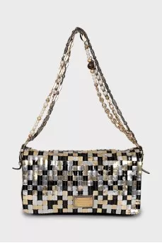 Suede bag with decorated handles