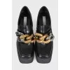 Leather ankle boots with chunky chain