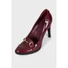 Red shoes with gold decor