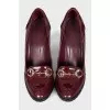 Red shoes with gold decor