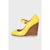 Yellow patent leather wedge sandals