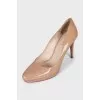 Beige patent leather shoes