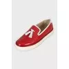 Red patent leather loafers