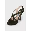 Green sandals with a figured heel