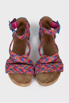 Leather sandals with woven elements