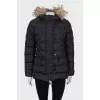 Jacket with a hood decorated with fur