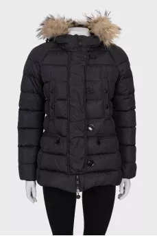 Jacket with a hood decorated with fur