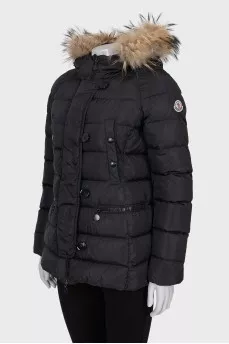 Jacket with a hood decorated with fur