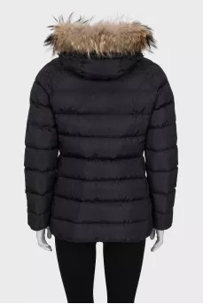 Jacket with a hood decorated with fur