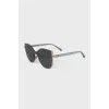 Sunglasses with brand logo on lenses