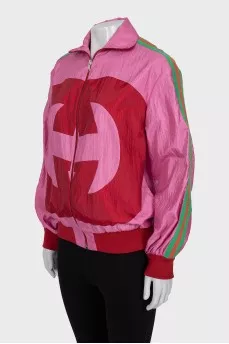 Pink windbreaker with brand logo