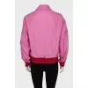 Pink windbreaker with brand logo