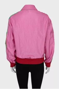 Pink windbreaker with brand logo