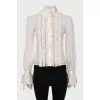 Blouse with lace ruffles