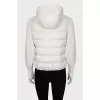 Jacket with knitted sleeves