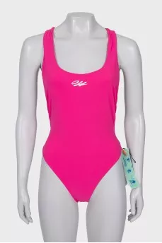 Backless swimsuit with tag