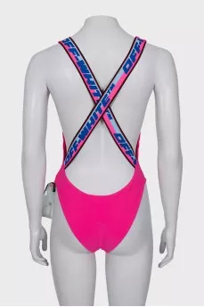 Backless swimsuit with tag