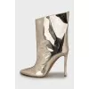 Gold patent leather ankle boots
