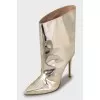 Gold patent leather ankle boots
