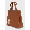 Brown bag with textile strap