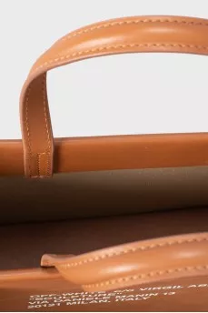 Brown bag with textile strap
