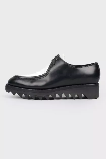Shoes with a white insert on a rough sole
