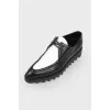 Shoes with a white insert on a rough sole