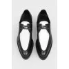 Shoes with a white insert on a rough sole