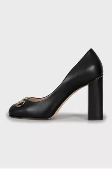 Black leather high heel shoes