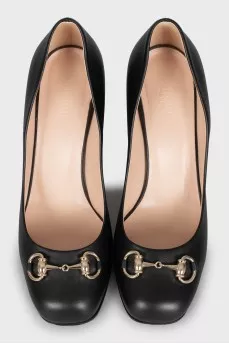 Black leather high heel shoes