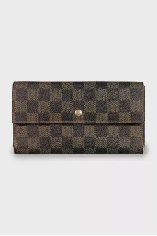 Brown canvas wallet with signature print