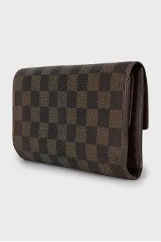 Brown canvas wallet with signature print