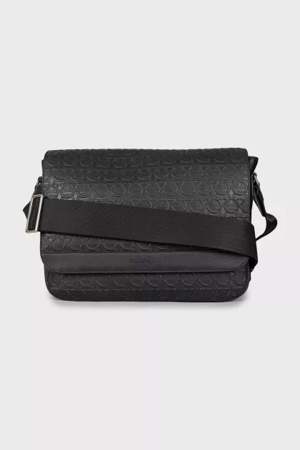 Leather bag with textile strap with tag