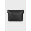 Leather bag with textile strap with tag