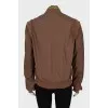 Brown bomber jacket with contrasting zipper