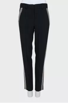 Trousers with silver decor on the side seam