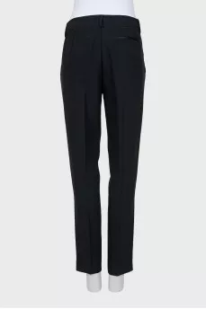 Trousers with silver decor on the side seam